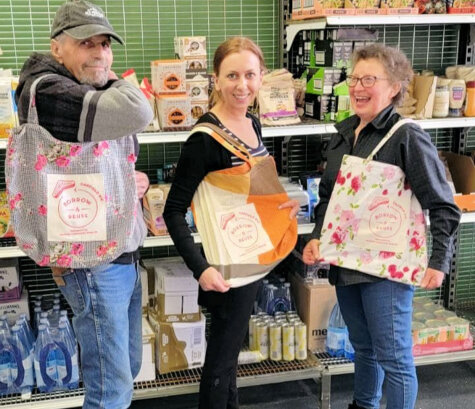Shelves with pantry staples for community members